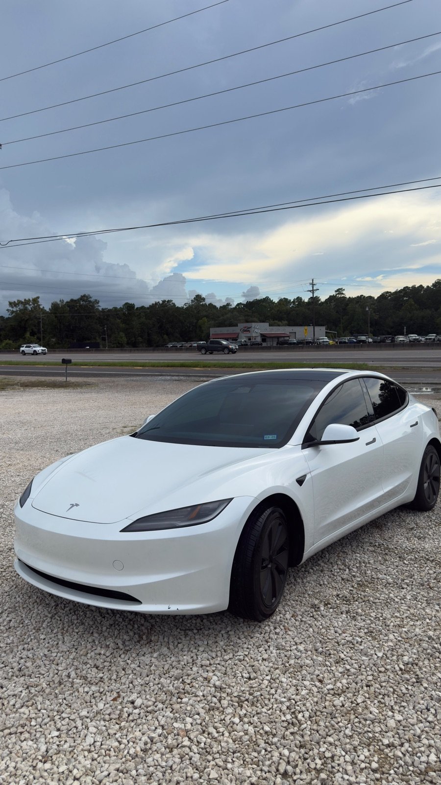 White Tesla Model 3 after a full detail